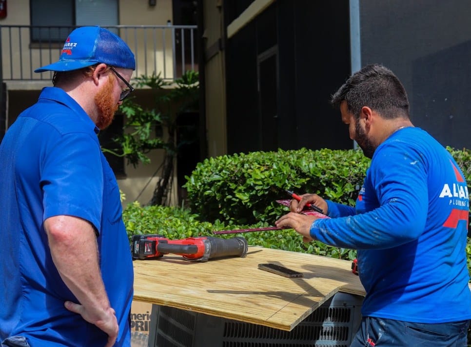 Alvarez HVAC technicians on a ductwork job serving Clearwater